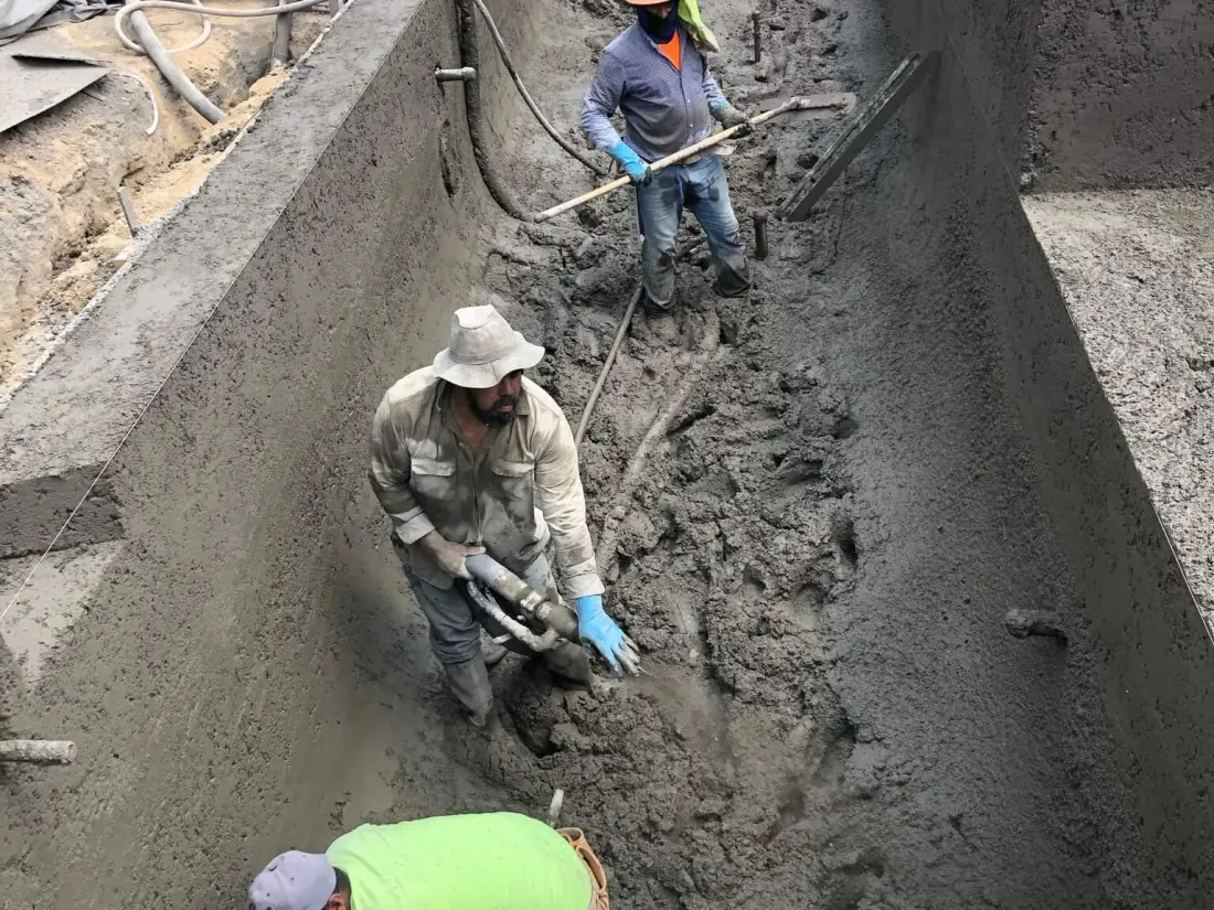 Westlake Village 2 Crew spraying and shaping gunite in a new pool shell