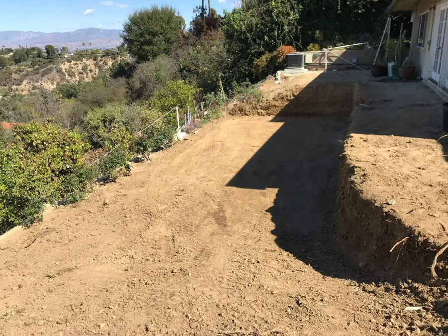 Raw hillside lot in Los Angeles before excavation for a new pool