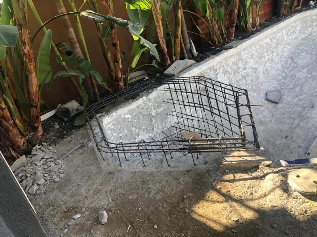 Rebar framing for a new spa inside the shell of an existing pool